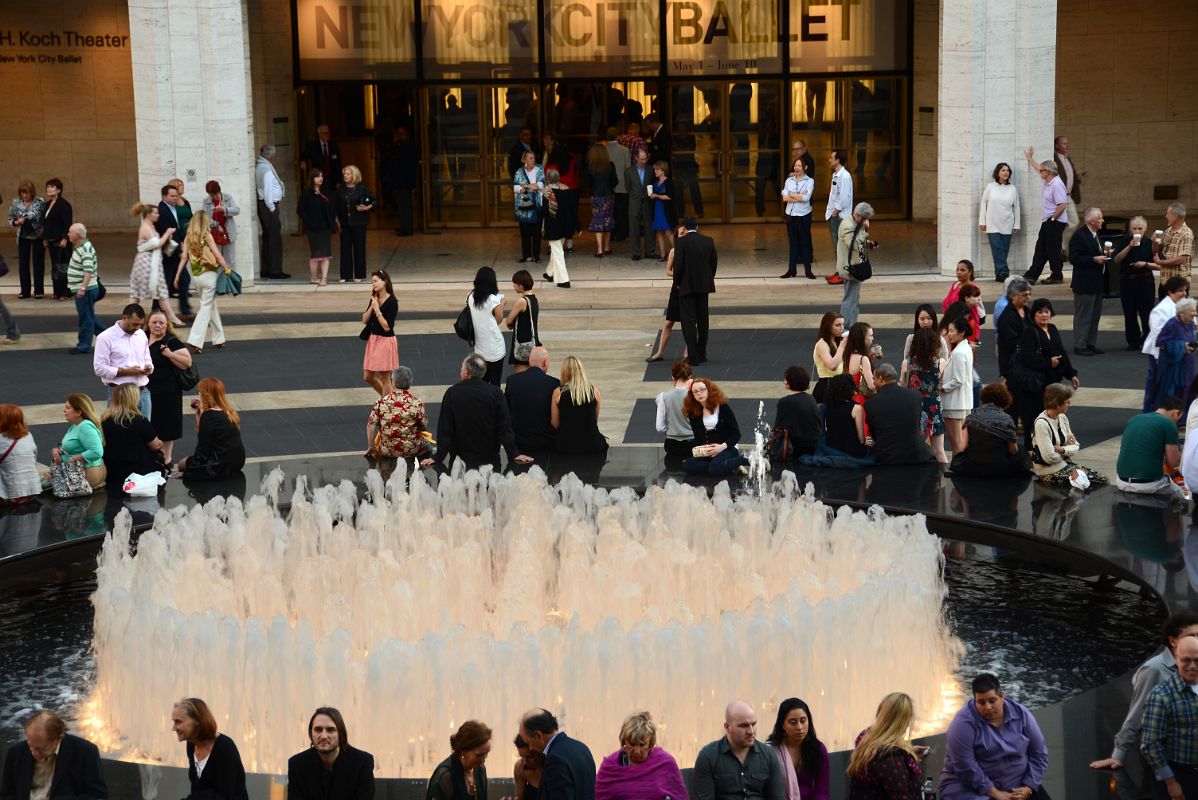 02-1 People Sitting Around The Revson Fountain Waiting For Their Ballet, Opera Or Classical Music To Begin In Lincoln Center New York City